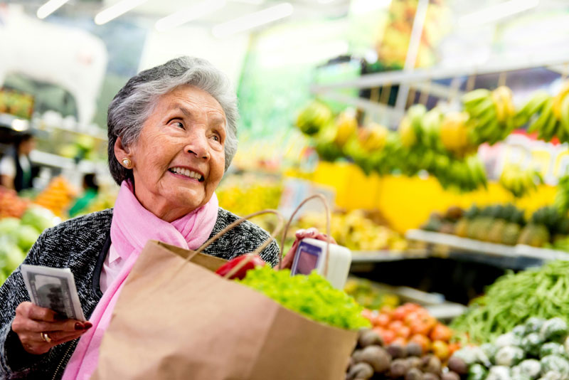 Senior woman shopping for groceries