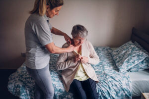 caregiver-assisting-senior-lady